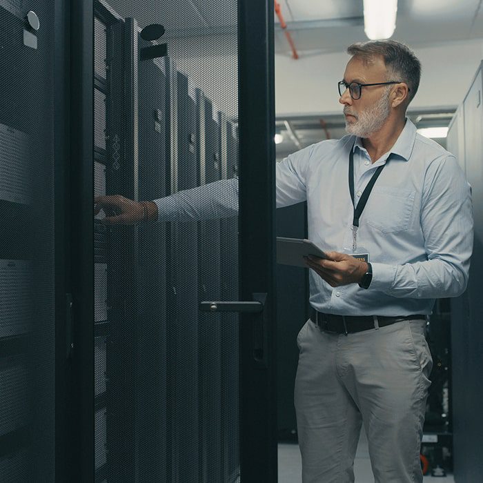 Technician checking digital data